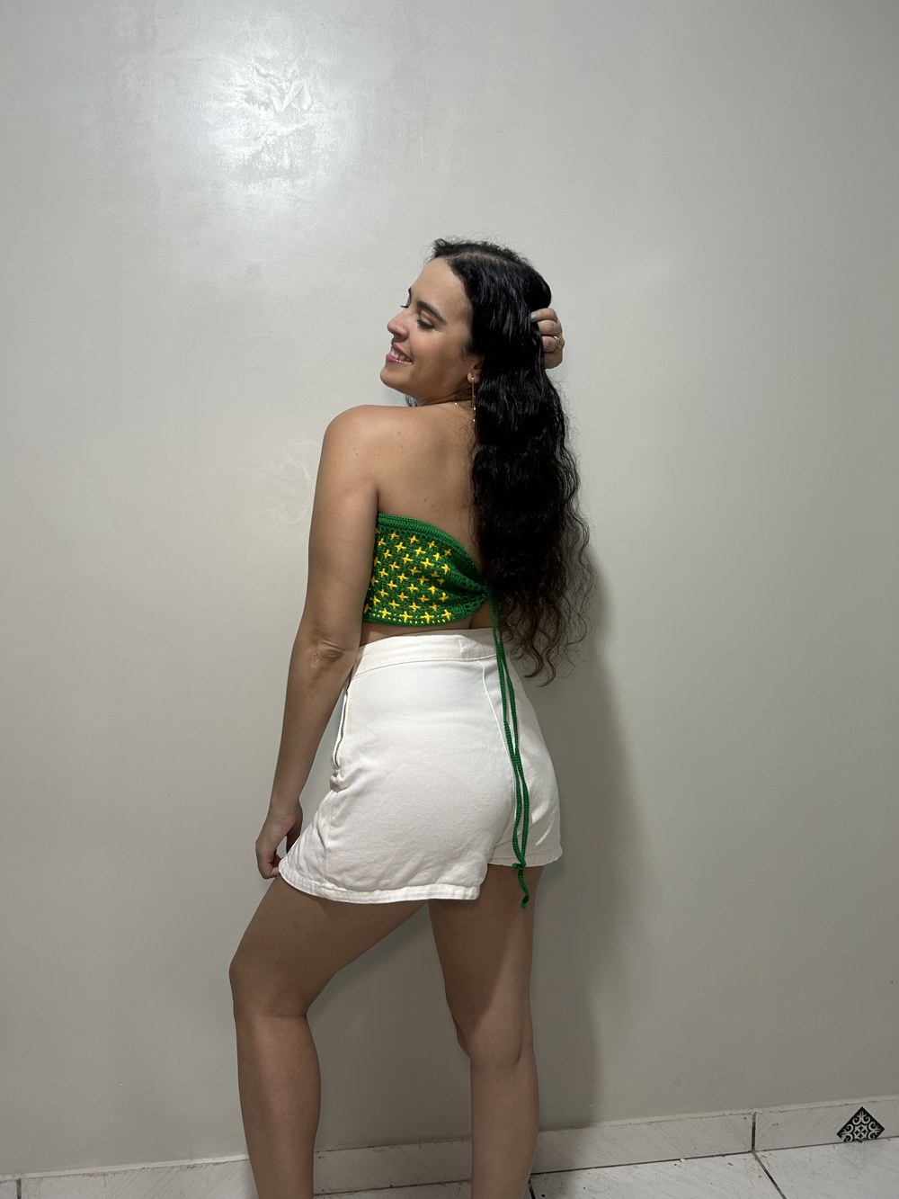 Vista lateral do Top dupla face mostrando o caimento e a amarração